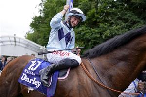 NEWMARKET, ENGLAND - JULY 10: Tom Marquand riding Starman celebrates after winning The Darley July Cup Stakes at Newmarket Racecourse on July 10, 2021 in Newmarket, England. Due to the Coronavirus pandemic, only owners along with a limited number of the paying public will be allowed to attend the meeting. (Photo by Alan Crowhurst/Getty Images)