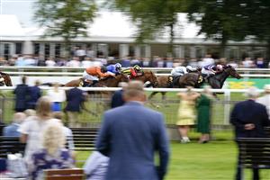 NEWMARKET, ENGLAND - JULY 10: Tom Marquand riding Spirit Of Bermuda (R, pink cap) win The Bedford Lodge Hotel & Spa Fillies' Handicap at Newmarket Racecourse on July 10, 2021 in Newmarket, England. Due to the Coronavirus pandemic, only owners along with a limited number of the paying public will be allowed to attend the meeting. (Photo by Alan Crowhurst/Getty Images)