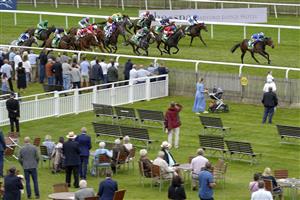 NEWMARKET, ENGLAND - JULY 10: Frankie Dettori riding Motakhayyel slip clear to win The bet365 Bunbury Cup at Newmarket Racecourse on July 10, 2021 in Newmarket, England. Due to the Coronavirus pandemic, only owners along with a limited number of the paying public will be allowed to attend the meeting. (Photo by Alan Crowhurst/Getty Images)