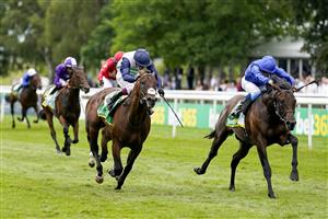 NEWMARKET, ENGLAND - JULY 10: William Buick riding Native Trail (R, blue) win The bet365 Superlative Stakes at Newmarket Racecourse on July 10, 2021 in Newmarket, England. Due to the Coronavirus pandemic, only owners along with a limited number of the paying public will be allowed to attend the meeting. (Photo by Alan Crowhurst/Getty Images)