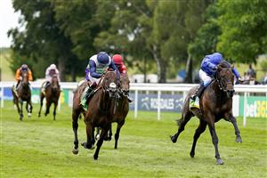 NEWMARKET, ENGLAND - JULY 10: William Buick riding Native Trail (R, blue) win The bet365 Superlative Stakes at Newmarket Racecourse on July 10, 2021 in Newmarket, England. Due to the Coronavirus pandemic, only owners along with a limited number of the paying public will be allowed to attend the meeting. (Photo by Alan Crowhurst/Getty Images)