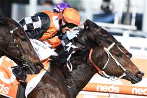 MELBOURNE, AUSTRALIA - JULY 10: Brett Prebble riding Belsielle winning Race 4, the Michael Fox Handicap, during Melbourne Racing at Caulfield Racecourse on July 10, 2021 in Melbourne, Australia. (Photo by Vince Caligiuri/Getty Images)