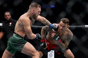 LAS VEGAS, NEVADA - JULY 10: Conor McGregor of Ireland attempts a punch against Dustin Poirier in the first round in their lightweight bout during UFC 264: Poirier v McGregor 3 at T-Mobile Arena on July 10, 2021 in Las Vegas, Nevada. (Getty Images)
