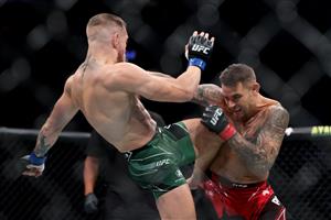 LAS VEGAS, NEVADA - JULY 10: Conor McGregor of Ireland lands a knee on Dustin Poirier in the first round in their lightweight bout during UFC 264: Poirier v McGregor 3 at T-Mobile Arena on July 10, 2021 in Las Vegas, Nevada. (Getty Images)
