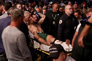 LAS VEGAS, NEVADA - JULY 10: Conor McGregor of Ireland is carried out of the arena on a stretcher after injuring his ankle in the first round of his lightweight bout against Dustin Poirier during UFC 264: Poirier v McGregor 3 at T-Mobile Arena on July 10, 2021 in Las Vegas, Nevada. (Getty Images)