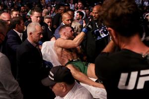LAS VEGAS, NEVADA - JULY 10: Conor McGregor of Ireland is carried out of the arena on a stretcher after injuring his ankle in the first round of his lightweight bout against Dustin Poirier during UFC 264: Poirier v McGregor 3 at T-Mobile Arena on July 10, 2021 in Las Vegas, Nevada. (Getty Images)