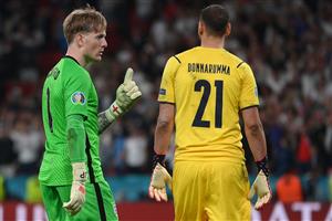 England's goalkeeper Jordan Pickford (L) speaks with Italy's goalkeeper Gianluigi Donnarumma during the UEFA EURO 2020 final football match between Italy and England at the Wembley Stadium in London on July 11, 2021. (Getty Images)