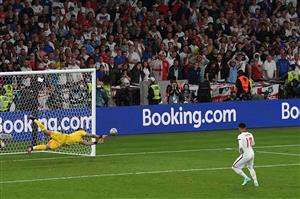 Italy's goalkeeper Gianluigi Donnarumma (L) saves the penalty of England's forward Jadon Sancho during the UEFA EURO 2020 final football match between Italy and England at the Wembley Stadium in London on July 11, 2021. (Getty Images)