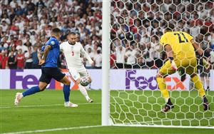 LONDON, ENGLAND - JULY 11: Luke Shaw of England scores their side's first goal past Gianluigi Donnarumma of Italy during the UEFA Euro 2020 Championship Final between Italy and England at Wembley Stadium on July 11, 2021 in London, England. (Getty Images)