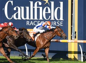 MELBOURNE, AUSTRALIA - JULY 10: Jamie Kah riding Deep Speed winning Race 2, the Neds Filter Form Handicap, during Melbourne Racing at Caulfield Racecourse on July 10, 2021 in Melbourne, Australia. The win on Deep Speed brought up one hundred city winners in a season for the first time by a jockey in the history in Melbourne. (Photo by Vince Caligiuri/Getty Images)
