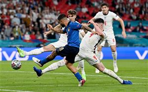 LONDON, ENGLAND - JULY 11: Lorenzo Insigne of Italy shoots whilst under pressure from John Stones and Declan Rice of England during the UEFA Euro 2020 Championship Final between Italy and England at Wembley Stadium on July 11, 2021 in London, England. (Getty Images)