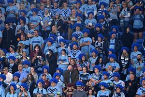 GOLD COAST, AUSTRALIA - JULY 14: Blues fans watch game three of the 2021 State of Origin Series between the New South Wales Blues and the Queensland Maroons at Cbus Super Stadium on July 14, 2021 in Gold Coast, Australia. (Photo by Bradley Kanaris/Getty Images)