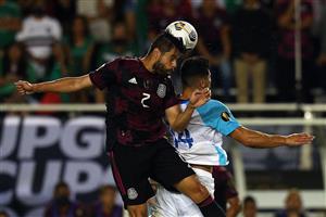 DALLAS, TEXAS - JULY 14: Nestor Araujo #2 of Mexico heads the ball away from Darwin Lom #14 of Guatemala at Cotton Bowl on July 14, 2021 in Dallas, Texas. (Getty Images)