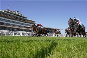 NEWBURY, ENGLAND - JULY 17: Sean Levey riding Gubbass (maroon) win The Weatherbys Super Sprint Stakes at Newbury Racecourse on July 17, 2021 in Newbury, England. Due to the Coronavirus pandemic, only owners along with a limited number of the paying public will be allowed to attend the meeting. (Photo by Alan Crowhurst/Getty Images)