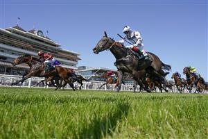 NEWBURY, ENGLAND - JULY 17: Sean Levey riding Gubbass (maroon) win The Weatherbys Super Sprint Stakes at Newbury Racecourse on July 17, 2021 in Newbury, England. Due to the Coronavirus pandemic, only owners along with a limited number of the paying public will be allowed to attend the meeting. (Photo by Alan Crowhurst/Getty Images)