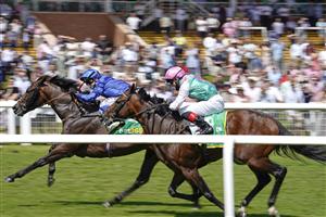 NEWBURY, ENGLAND - JULY 17: Marco Ghiani riding Real World (L) win The bet365 Stakes at Newbury Racecourse on July 17, 2021 in Newbury, England. Due to the Coronavirus pandemic, only owners along with a limited number of the paying public will be allowed to attend the meeting. (Photo by Alan Crowhurst/Getty Images)