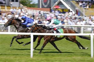 NEWBURY, ENGLAND - JULY 17: Marco Ghiani riding Real World (L) win The bet365 Stakes at Newbury Racecourse on July 17, 2021 in Newbury, England. Due to the Coronavirus pandemic, only owners along with a limited number of the paying public will be allowed to attend the meeting. (Photo by Alan Crowhurst/Getty Images)