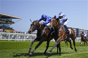 NEWBURY, ENGLAND - JULY 17: Louis Steward riding Home City (L) pass the post first in The bet365 EBF Novice Stakes only to lose the race in the Stewards room to Silvestre De Sousa riding Tropez Power (R) at Newbury Racecourse on July 17, 2021 in Newbury, England. Due to the Coronavirus pandemic, only owners along with a limited number of the paying public will be allowed to attend the meeting. (Photo by Alan Crowhurst/Getty Images)