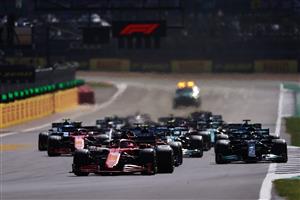 NORTHAMPTON, ENGLAND - JULY 18: Charles Leclerc of Monaco driving the (16) Scuderia Ferrari SF21 leads the field into turn one at the restart during the F1 Grand Prix of Great Britain at Silverstone on July 18, 2021 in Northampton, England. (Getty Images)