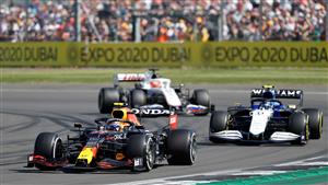 Red Bull's Mexican driver Sergio Perez (L) drives during the Formula One British Grand Prix motor race at Silverstone motor racing circuit in Silverstone, central England on July 18, 2021. (Getty Images)