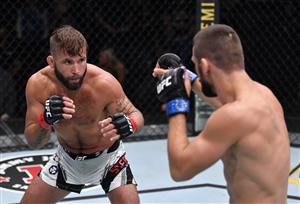 LAS VEGAS, NEVADA - JULY 17: In this handout photo provided by UFC, (L-R) Jeremy Stephens battles Mateusz Gamrot of Poland in their lightweight bout during the UFC Fight Night event at UFC APEX on July 17, 2021 in Las Vegas, Nevada. (Getty Images)