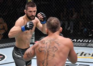 LAS VEGAS, NEVADA - JULY 17: In this handout photo provided by UFC, (L-R) Mateusz Gamrot of Poland battles Jeremy Stephens in their lightweight bout during the UFC Fight Night event at UFC APEX on July 17, 2021 in Las Vegas, Nevada. (Getty Images)