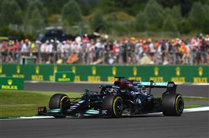 NORTHAMPTON, ENGLAND - JULY 18: Lewis Hamilton of Great Britain driving the (44) Mercedes AMG Petronas F1 Team Mercedes W12 during the F1 Grand Prix of Great Britain at Silverstone on July 18, 2021 in Northampton, England. (Getty Images)