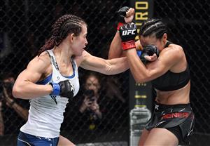 LAS VEGAS, NEVADA - JULY 17: In this handout photo provided by UFC, (L-R) Miesha Tate punches Marion Reneau in their bantamweight bout during the UFC Fight Night event at UFC APEX on July 17, 2021 in Las Vegas, Nevada. (Getty Images)