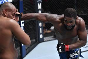 LAS VEGAS, NEVADA - JULY 17: In this handout photo provided by UFC, (R-L) Alan Baudot of France punches Rodrigo Nascimento of Brazil in their heavyweight bout during the UFC Fight Night event at UFC APEX on July 17, 2021 in Las Vegas, Nevada. (Getty Images)