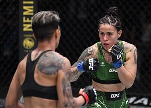 LAS VEGAS, NEVADA - JULY 17: In this handout photo provided by UFC, (R-L) Montserrat Conejo of Mexico battles Amanda Lemos of Brazil in their strawweight bout during the UFC Fight Night event at UFC APEX on July 17, 2021 in Las Vegas, Nevada. (Getty Images)