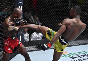 LAS VEGAS, NEVADA - JULY 17: In this handout photo provided by UFC, (R-L) Francisco Figueiredo of Brazil kicks Malcolm Gordon of Canada in their flyweight bout during the UFC Fight Night event at UFC APEX on July 17, 2021 in Las Vegas, Nevada. (Getty Images)