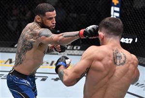 LAS VEGAS, NEVADA - JULY 17: In this handout photo provided by UFC, (L-R) Daniel Rodriguez punches Preston Parsons in their welterweight bout during the UFC Fight Night event at UFC APEX on July 17, 2021 in Las Vegas, Nevada. (Getty Images)