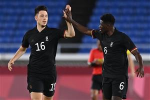 Germany's forward Ragnar Ache (R) celebrates with Germany's defender Keven Schlotterbeck after scoring Germany's second goal during the Tokyo 2020 Olympic Games men's group D first round football match between Brazil and Germany at the Yokohama International Stadium in Yokohama on July 22, 2021. (Getty Images)
