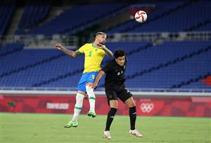 YOKOHAMA, JAPAN - JULY 22: Luiz Douglas #5 of Team Brazil competes for a header with Nadiem Amiri #11 of Team Germany during the Men's First Round Group D match between Brazil and Germany during the Tokyo 2020 Olympic Games at International Stadium Yokohama on July 22, 2021 in Yokohama, Tokyo, Japan. (Getty Images)