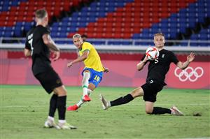 YOKOHAMA, JAPAN - JULY 22: Richarlison #10 of Team Brazil scores their side's third goal during the Men's First Round Group D match between Brazil and Germany during the Tokyo 2020 Olympic Games at International Stadium Yokohama on July 22, 2021 in Yokohama, Tokyo, Japan. (Getty Images)