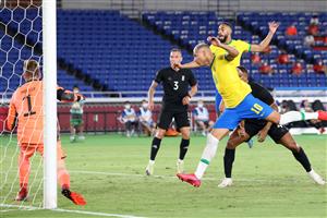 Brazil's forward Richarlison (R) scores a header and his side's second goal during the Tokyo 2020 Olympic Games men's group D first round football match between Brazil and Germany at the Yokohama International Stadium in Yokohama on July 22, (Getty Images)