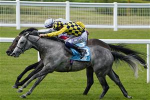 ASCOT, ENGLAND - JULY 23: David Probert riding Alfred Boucher (yellow/black check) win The John Guest Racing Handicap at Ascot Racecourse on July 23, 2021 in Ascot, England. (Photo by Alan Crowhurst/Getty Images)