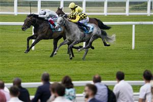 ASCOT, ENGLAND - JULY 23: David Probert riding Alfred Boucher (yellow/black check) win The John Guest Racing Handicap at Ascot Racecourse on July 23, 2021 in Ascot, England. (Photo by Alan Crowhurst/Getty Images)