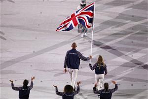 TOKYO, JAPAN - JULY 23: Flag bearers Hannah Mills and Mohamed Sbihi of Team Great Britain lead their team during the Opening Ceremony of the Tokyo 2020 Olympic Games at Olympic Stadium on July 23, 2021 in Tokyo, Japan. (Getty Images)