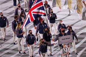 TOKYO, JAPAN - JULY 23: Flag bearers Hannah Mills and Mohamed Sbihi of Team Great Britain lead their team out during the Opening Ceremony of the Tokyo 2020 Olympic Games at Olympic Stadium on July 23, 2021 in Tokyo, Japan. (Getty Images)