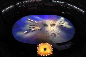 An overview shows performers assembling the Olympic Rings during the opening ceremony of the Tokyo 2020 Olympic Games, at the Olympic Stadium, in Tokyo, on July 23, 2021. (Getty Images)