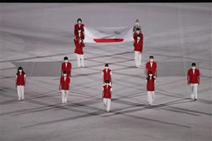 TOKYO, JAPAN - JULY 23: The Japanese National Flag is brought onto the stage during the Opening Ceremony of the Tokyo 2020 Olympic Games at Olympic Stadium on July 23, 2021 in Tokyo, Japan. (Getty Images)