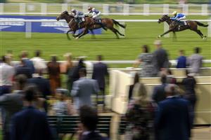 ASCOT, ENGLAND - JULY 24: Daniel Tudhope riding Southern Voyage (L) win The Sebastian's Action Trust Handicap at Ascot Racecourse on July 24, 2021 in Ascot, England. (Photo by Alan Crowhurst/Getty Images)