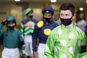 ASCOT, ENGLAND - JULY 24: Oisin Murphy leads the jockeys out for the second race at Ascot Racecourse on July 24, 2021 in Ascot, England. (Photo by Alan Crowhurst/Getty Images)