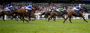 ASCOT, ENGLAND - JULY 24: William Buick riding Danyah (R, blue/pink cap) win The Moet & Chandon International Stakes at Ascot Racecourse on July 24, 2021 in Ascot, England. (Photo by Alan Crowhurst/Getty Images)