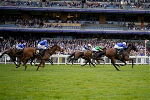 ASCOT, ENGLAND - JULY 24: William Buick riding Danyah (R, blue/pink cap) win The Moet & Chandon International Stakes at Ascot Racecourse on July 24, 2021 in Ascot, England. (Photo by Alan Crowhurst/Getty Images)