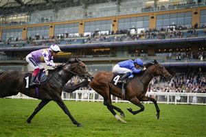 ASCOT, ENGLAND - JULY 24: William Buick riding New Science (blue) win The Pat Eddery Stakes at Ascot Racecourse on July 24, 2021 in Ascot, England. (Photo by Alan Crowhurst/Getty Images)
