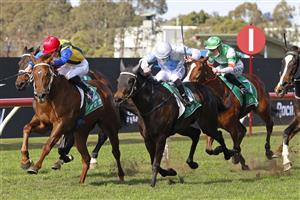 SYDNEY, AUSTRALIA - JULY 24: Brock Ryan on So Say You (white cap) wins race 2 the TAB Highway Class 3 Plate during Sydney Racing at Rosehill Gardens on July 24, 2021 in Sydney, Australia. (Photo by Mark Evans/Getty Images)