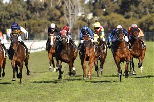 SYDNEY, AUSTRALIA - JULY 24: Brock Ryan on No Compromise (2nd from right) wins race 5 the Schweppes Handicap during Sydney Racing at Rosehill Gardens on July 24, 2021 in Sydney, Australia. (Photo by Mark Evans/Getty Images)