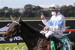 SYDNEY, AUSTRALIA - JULY 24: Brock Ryan on So Say You returns to scale after winning race 2 the TAB Highway Class 3 Plate during Sydney Racing at Rosehill Gardens on July 24, 2021 in Sydney, Australia. (Photo by Mark Evans/Getty Images)
